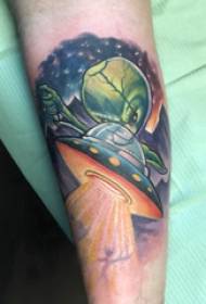 Alien tattoo girl alien on arm and UFO tattoo picture