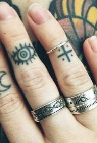 Finger moon eye cross totem tattoo pattern