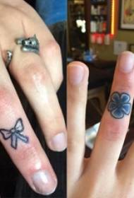 Minimalistic finger tattoo girl finger on flower and bow tattoo picture