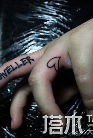 Дівчина пальцем стороні англійська татуювання