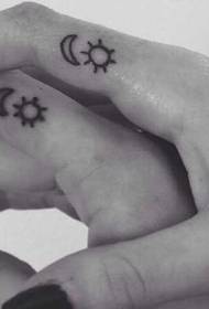 Finger couple little sun tattoo