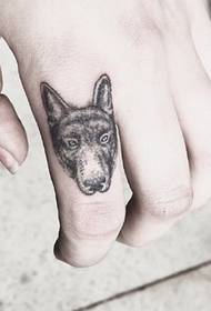 Naughty finger small animal tattoo