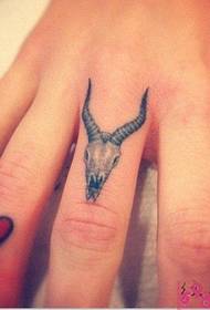Boy finger personality sheep head and heart tattoo picture