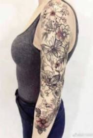 18 men's and women's large flower arm tattoo designs