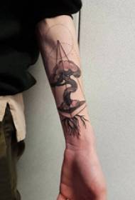 Plant tattoo boy's arm on geometry and life tree tattoo picture