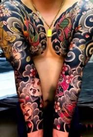 Flower Arm: A set of old traditional style large flower arm tattoo pictures