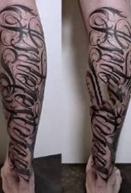 9 English black swashes tattoo on the arm