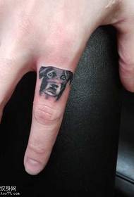 Padrão de tatuagem de avatar de filhote de cachorro bonito de dedo