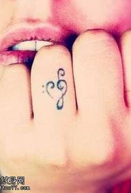 ນິ້ວມືຮູບແບບ tattoo ບັນທຶກນ້ອຍໆ