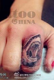 Shark ring tattoo on finger