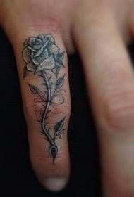 Tail finger black gray rose tattoo