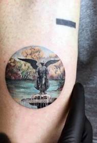 Tattoo landscape, boy's arm, round and sculpture tattoo picture