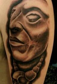 shoulder brown stone clown statue tattoo pattern