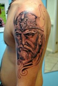 Коричневый тату с серьезным рисунком воина-викинга