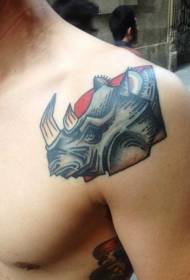 male shoulder colored rhinoceros head tattoo pattern