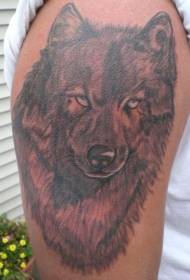 Brown blind wolf head tattoo on the shoulder