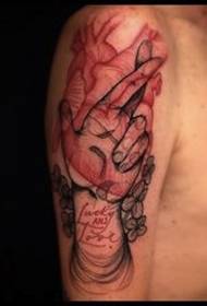 shoulder brown strange human hand with letter tattoo pattern