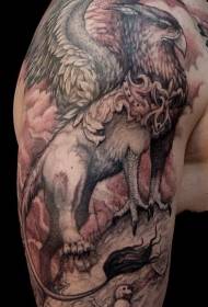 Na ramenu smeđi griffin model tetovaže životinja