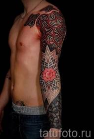 arm big dot painting style color ornament tattoo pattern