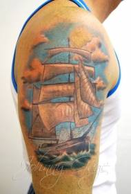 Big arm cartoon style colored sailboat tattoo pattern