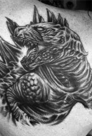 Evil black Godzilla tattoo on the shoulder