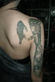 Arm creepy fantasy witch with bird tattoo pattern