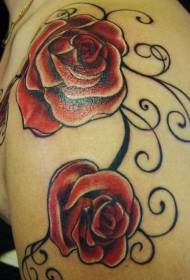 Two beautiful red rose tattoos on the shoulders