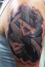 ນັກດົນຕີທີ່ແທ້ຈິງສີດໍາທີ່ມີຮູບແບບ tattoo guitar