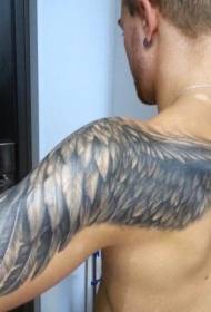 Black and white wings tattoo pattern with simple shoulder design