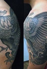 Huge black gray dance cock tattoo on the shoulder