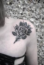 Cute black rose tattoo on the shoulder