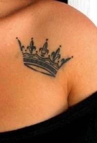 Beautiful black crown tattoo pattern on the shoulder
