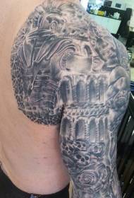 Olkapää ja käsivarsi hauska musta muinainen soturi tummassa vankityrmän tatuointikuviossa