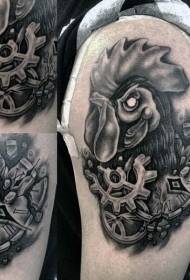 Engranatge mecànic fresc amb un braç gran amb un model de tatuatge de gall