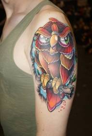 Big arm colored funny owl with twig tattoo pattern