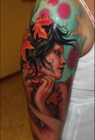 Big arm cute girl portrait with maple leaf tattoo pattern