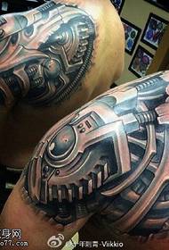 Classic robotic arm tattoo