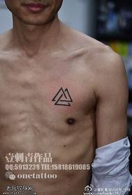 Triangular tattoo pattern on the shoulder