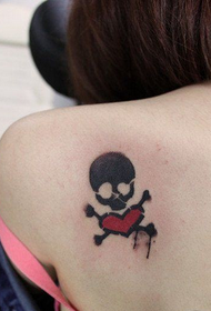 Woman shoulders cute pirate skull love tattoo picture