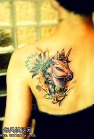 Beautiful unicorn tattoo on the shoulder