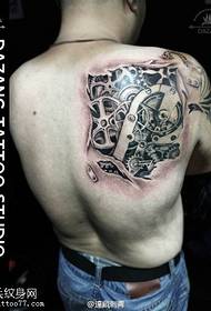 Mechanical tattoo pattern on the shoulder