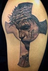 Cross and sad portrait of Jesus tattoo