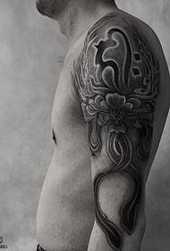 Sanskrit flower tattoo pattern on the shoulder