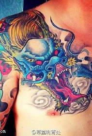 Padrão de tatuagem de dragão meio azul