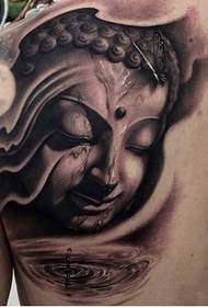 Buddha lub taub hau tattoo rau ntawm xub pwg