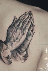 Skulder og hænder sammen tatoveringsmønster