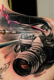 Shoulder camera tattoo pattern