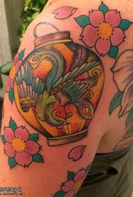 Phoenix lantern tattoo pattern on the shoulder