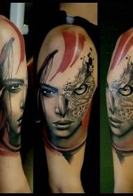 Big arm color woman face with owl eye tattoo pattern