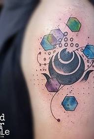 Painted geometric tattoo pattern on the shoulder